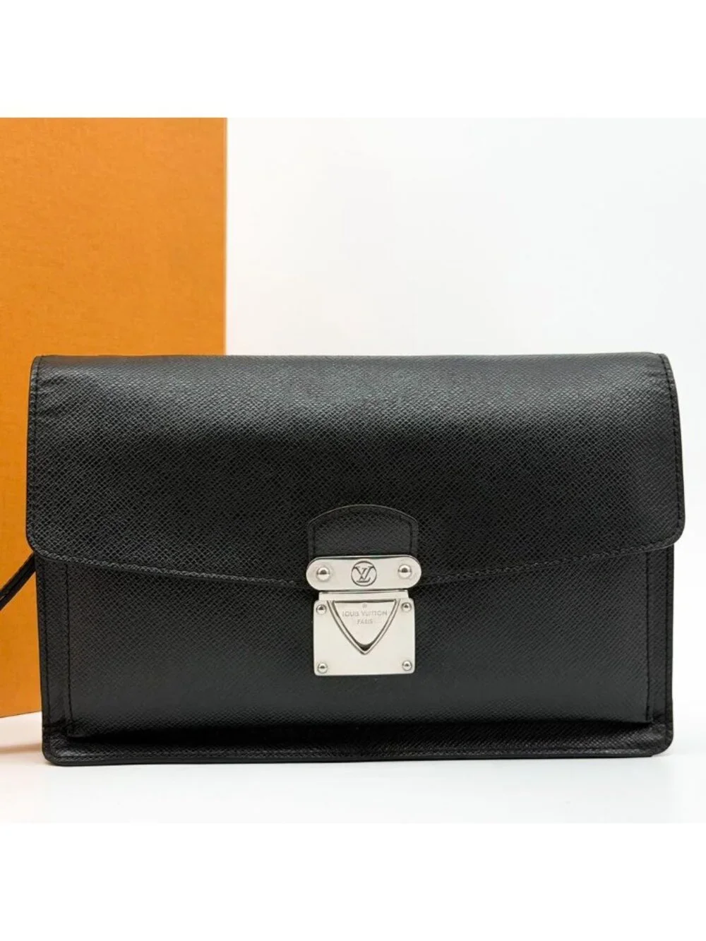 Louis Vuitton Belaia Taiga Clutch Leather